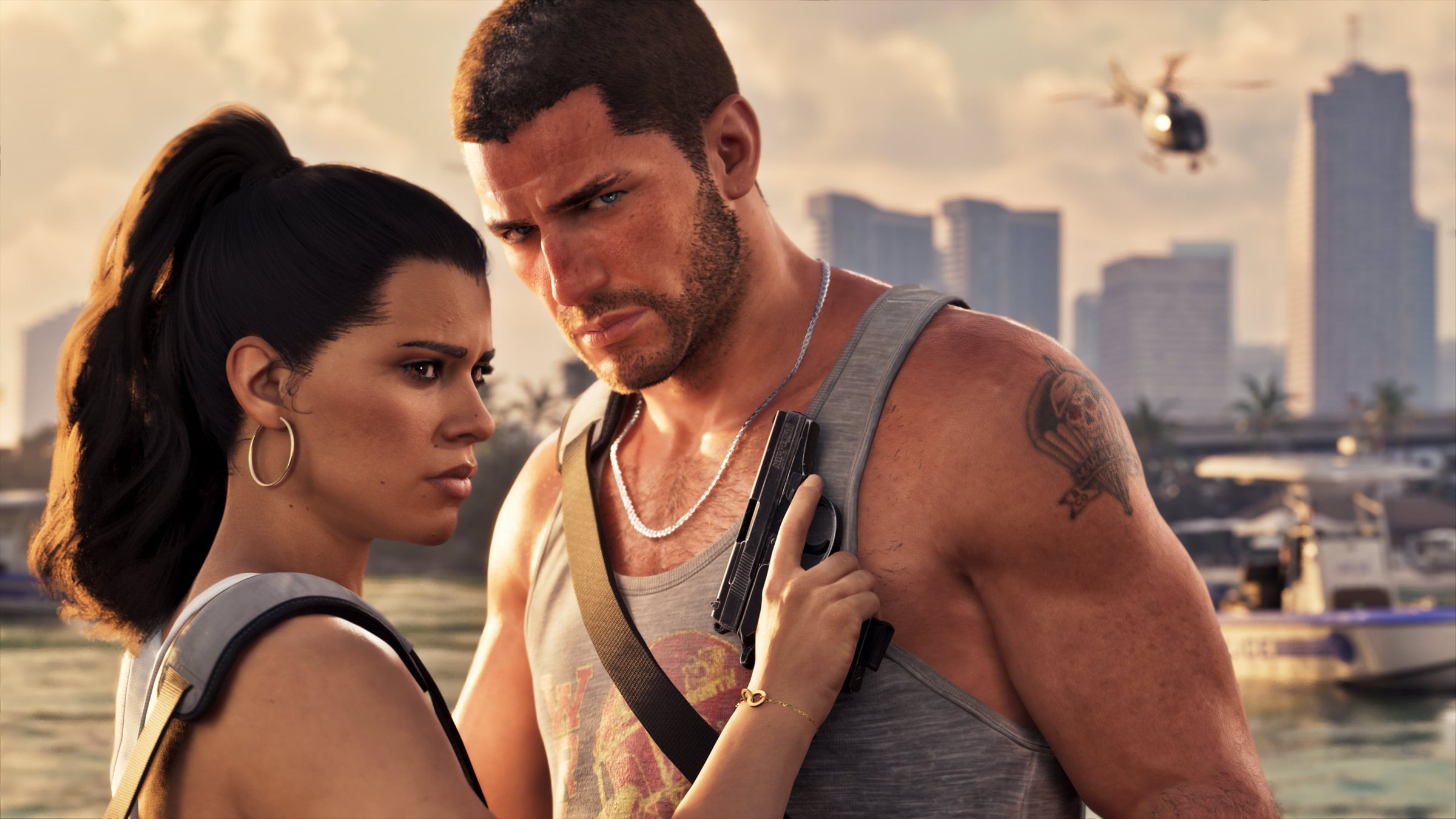 Jason and Lucia in Grand Theft Auto VI, with Lucia resting her hand on Jason's chest as a helicopter flies over the Vice City skyline